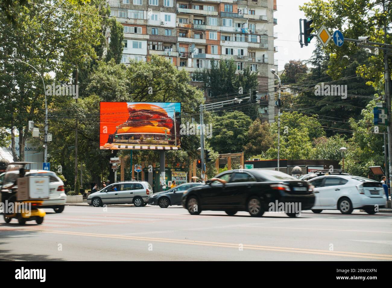 An advertisement for Wendy's Hamburgers on a digital billboard in Tbilisi, Georgia Stock Photo