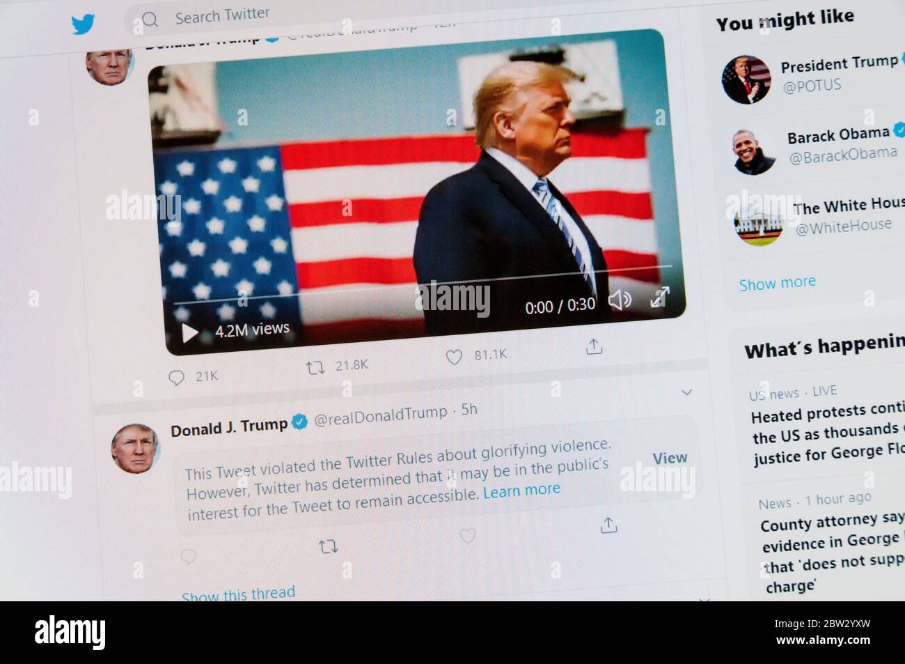Twitter has flagged one of Donald Trump's tweets with a warning that it glorifies violence.  However, it has been left accessible in the public interest. Stock Photo