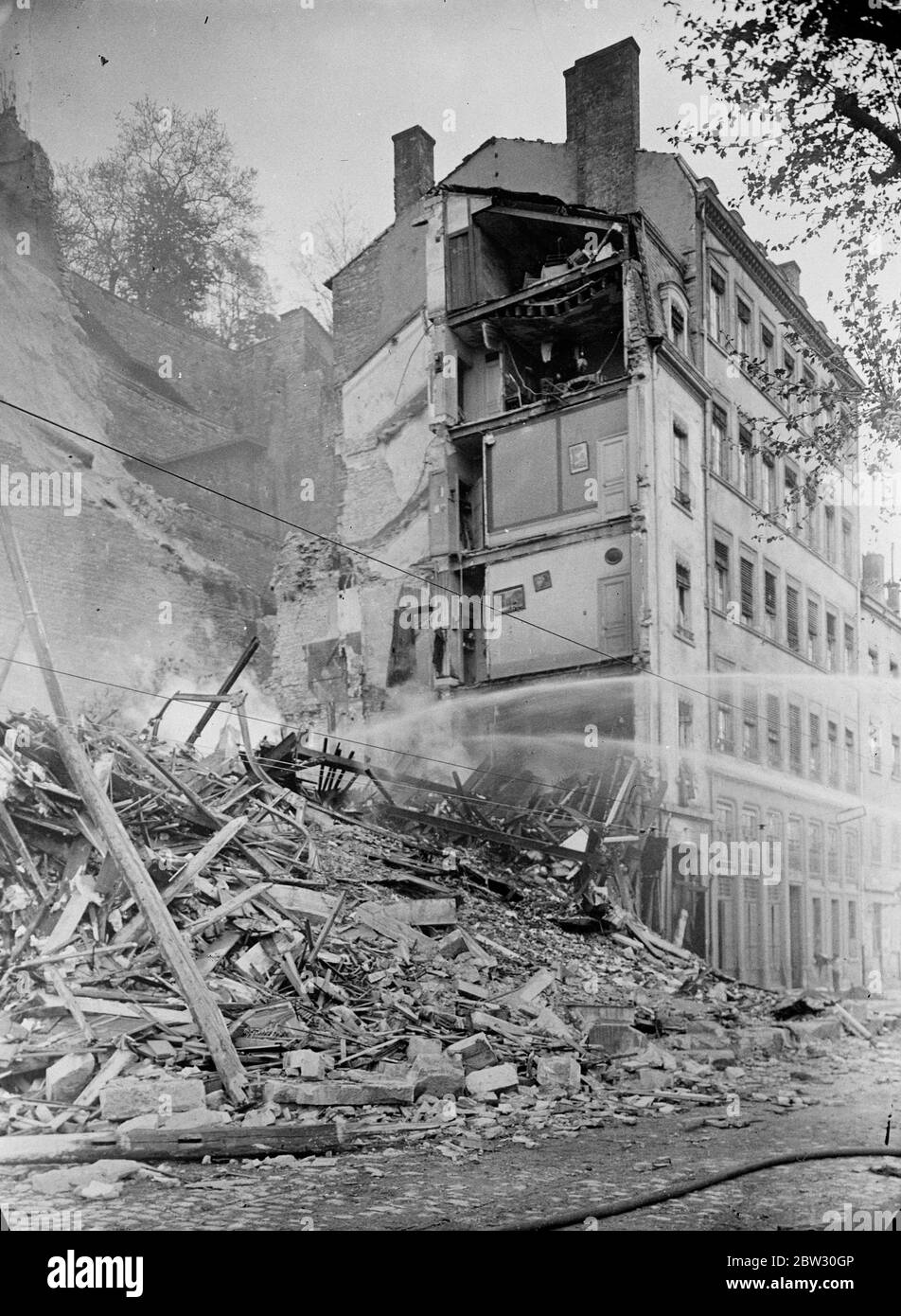 Thirty dead in Lyons landslide . Thirty people are believed to have lost their lives when a landslip wrecked two houses at the foot of Croix Rousse Hill , Lyons , France . Fire broke out adding to the disaster . The scene of the disaster at Lyons . 9 May 1932 Stock Photo