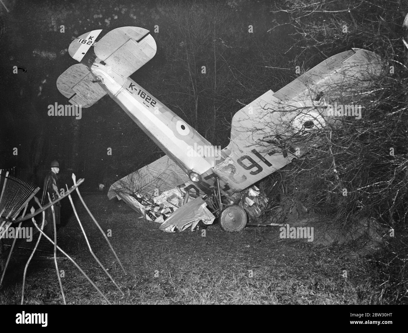 RAF planes crashes in London Park . A pilot flying a Royal Air Force plane from Kenley Aerodrome , crashed among a clump of trees at Forster Park , Catford , London . The wrecked plane after the crash at Forster Park , Catford . 11 June 1932 Stock Photo