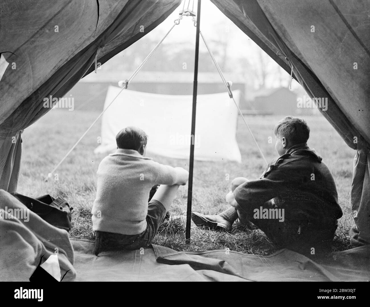 How long will the rain last ? Two scouts at Gilwell Park , near