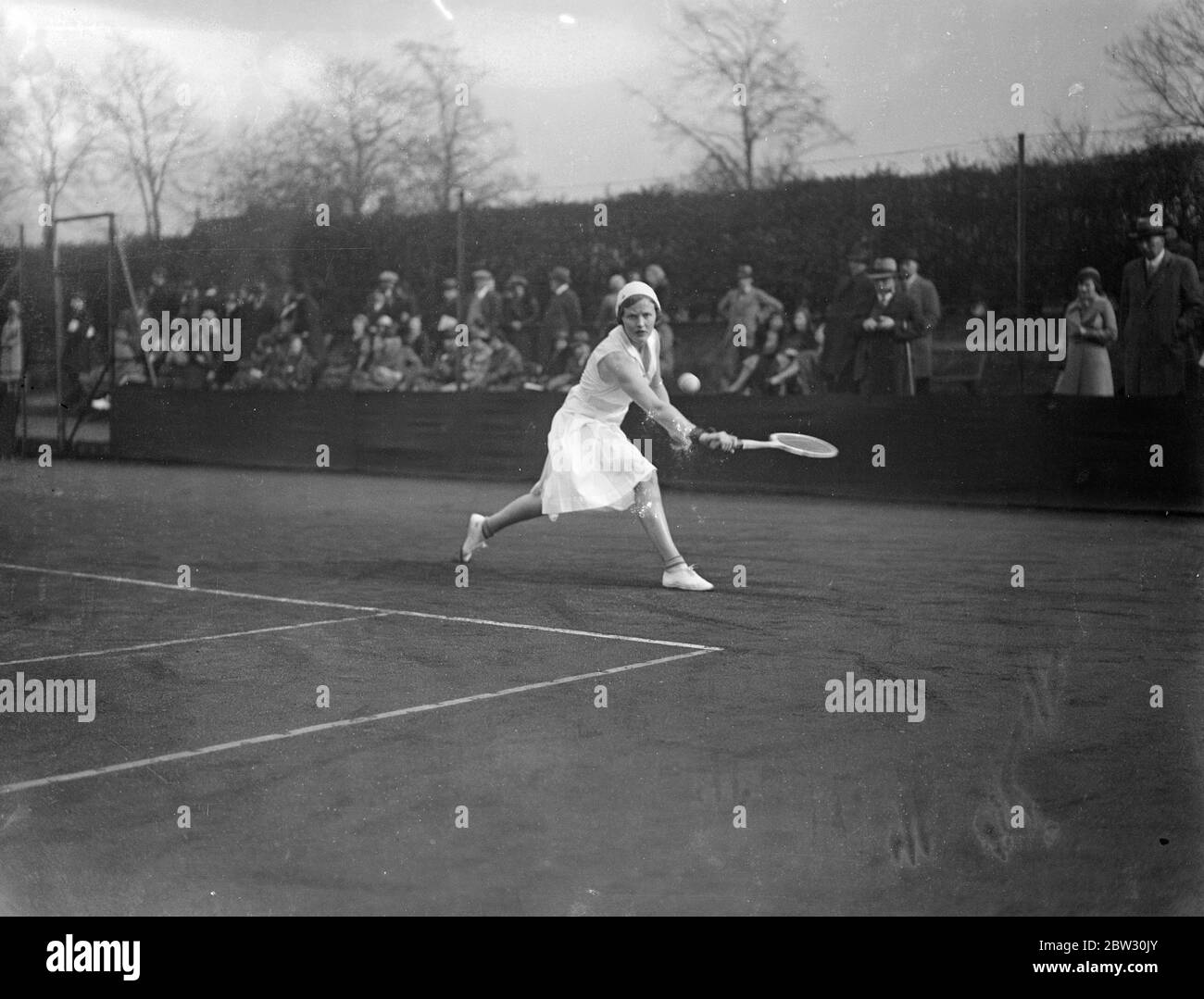 Surrey hard courts tennis championships at Roehampton . Miss Joan Ridley in action in the Surrey hard courts tennis championships at the Roehampton Club , London . 5 April 1932 Stock Photo