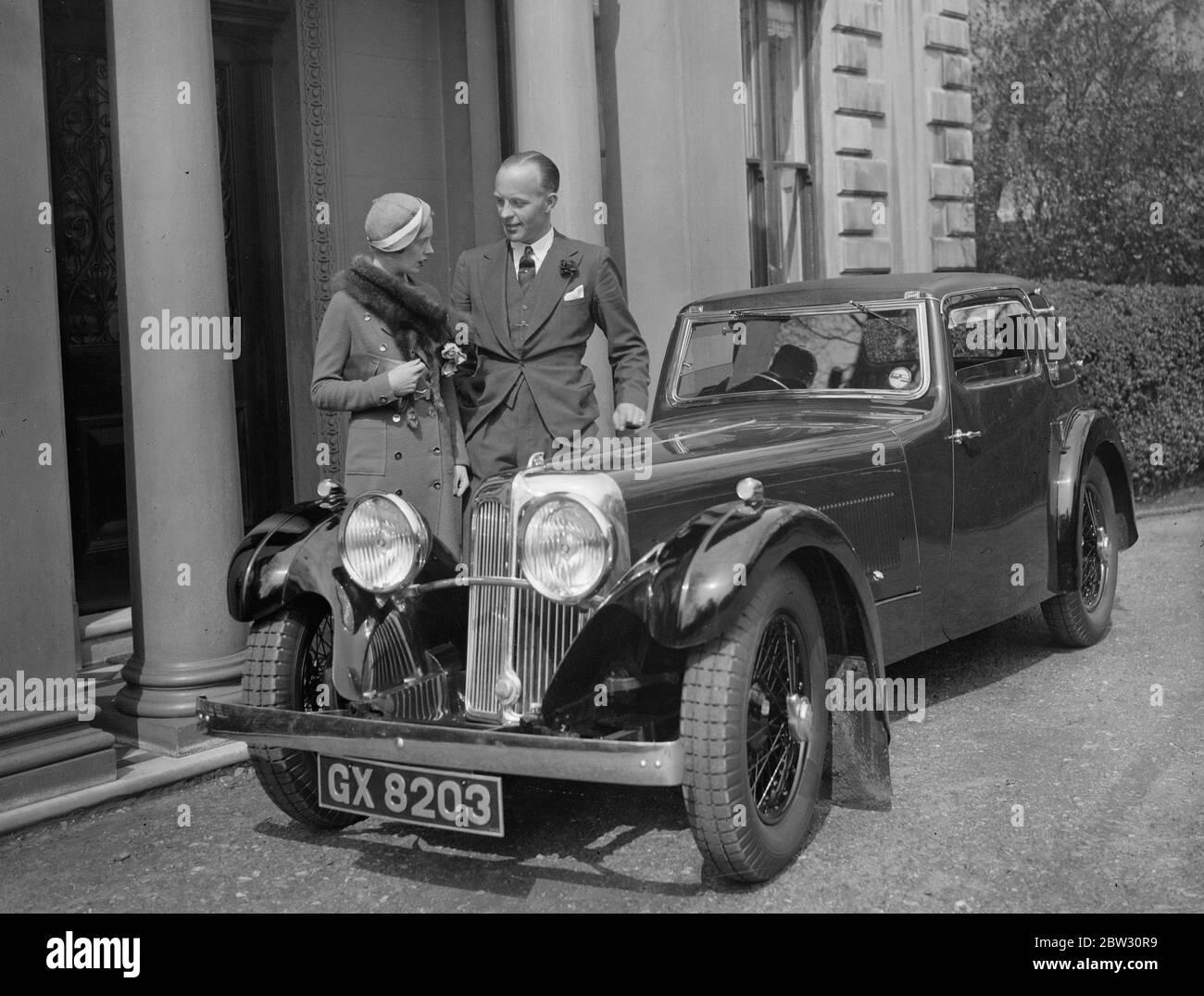 Colonel Leonard Ropner M C , MP engaged . The engagement is announced between Colonel Leonard Ropner M C , MP for the Barkston Asg Division of West Riding , Yorkshire , to Miss Esme Bruce Robertson , daughter of Mr and Mrs Bruce Robertsoin of Kensington . Colonell Leonard Ropner M C , MP , with his fiancee beside the car he gave her for an engagement present . 10 May 1932 Stock Photo