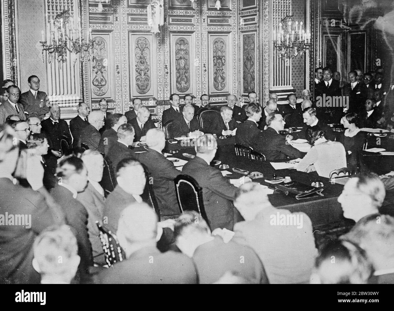 League council meets to discuss China , Japan war . The league of Nations Council convened at the mInistry of Foreign affairs in Paris in the most momentous session for years to work out a solution to prevent war between China and Japan over the Manchuria situation . The scene in the Salle d ' Horlorge while M Briand , the French Minister of Foreign Affairs read his opening speech while seated . Left to right Dr Sze of China , M Lerroux , Spain , M Von Bulow , Germany , M Scialoja , Italy , M Aristide Briand , Viscount Cecil , Sir John Simon , M Yoshizawa , Japan , M Fotitch , Yugoslavia , M Z Stock Photo