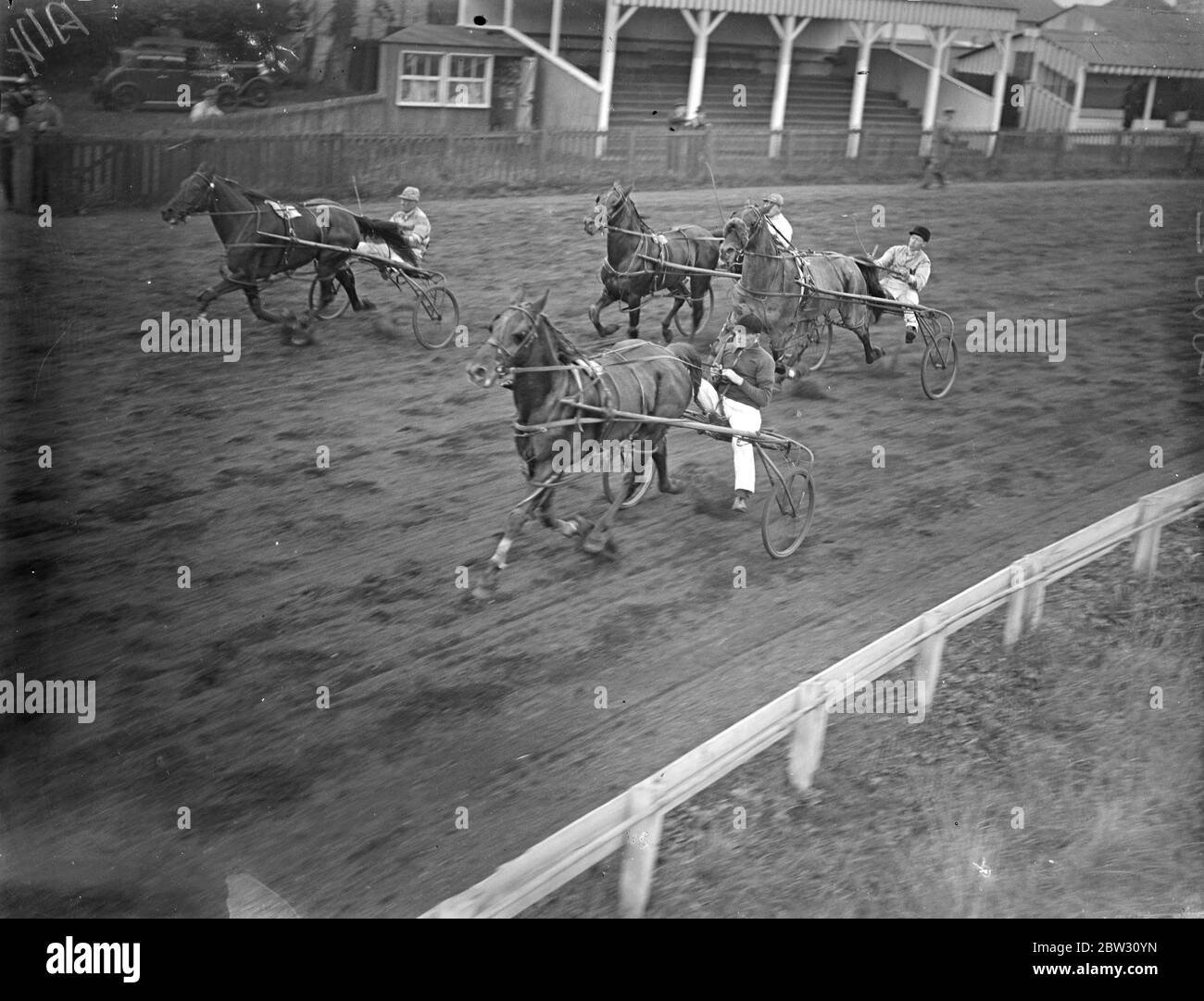 Winning by a nose at Greenford trotting races . Mr Craddock 's La Milo II , ridden by Mr Brazier , won the Amateur Drivers Sweepstake trotting race at Greenford , Middlesex , from Misery , by a nose . La Milo II nearest camera , winning the Amateur Drivers Sweepstake by a nose at Greenford . 5 September 1932 Stock Photo