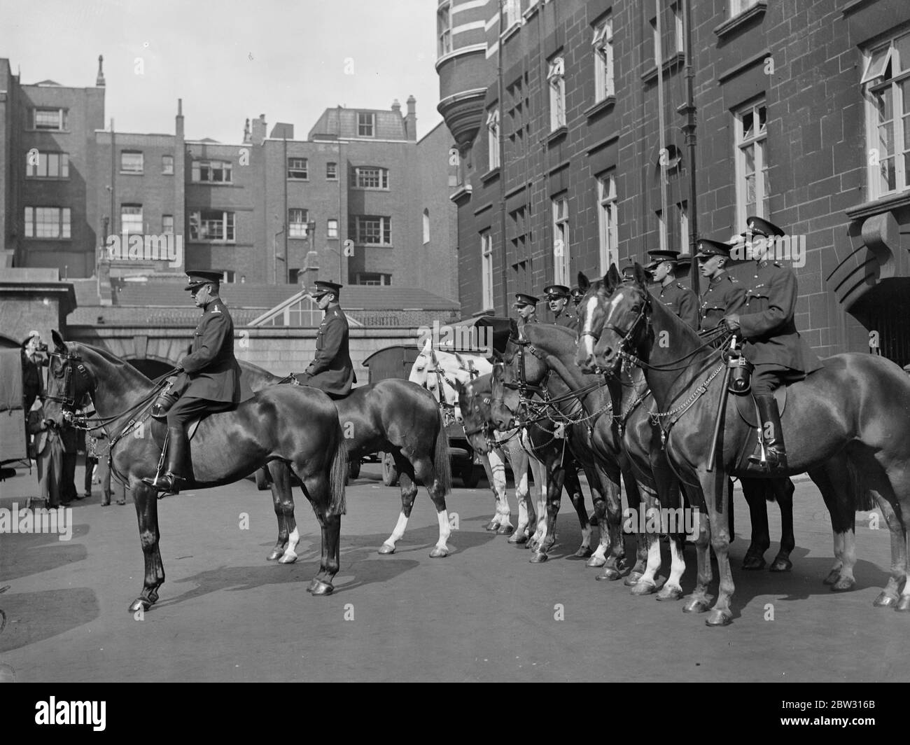 Mounted special constables parade for first time before starting duties in London . At the completion of their course of training in police duties , a squad of 100 mounted special constables who will shortly take over duties on the streets of London supervising crowds , directing traffic and on patrols , paraded for the first time at Cannon Row police station London . They are under the command of Major Dale Glossop . The new mounted specials on parade for the first time at Cannon Row , London . 31 August 1932 Stock Photo