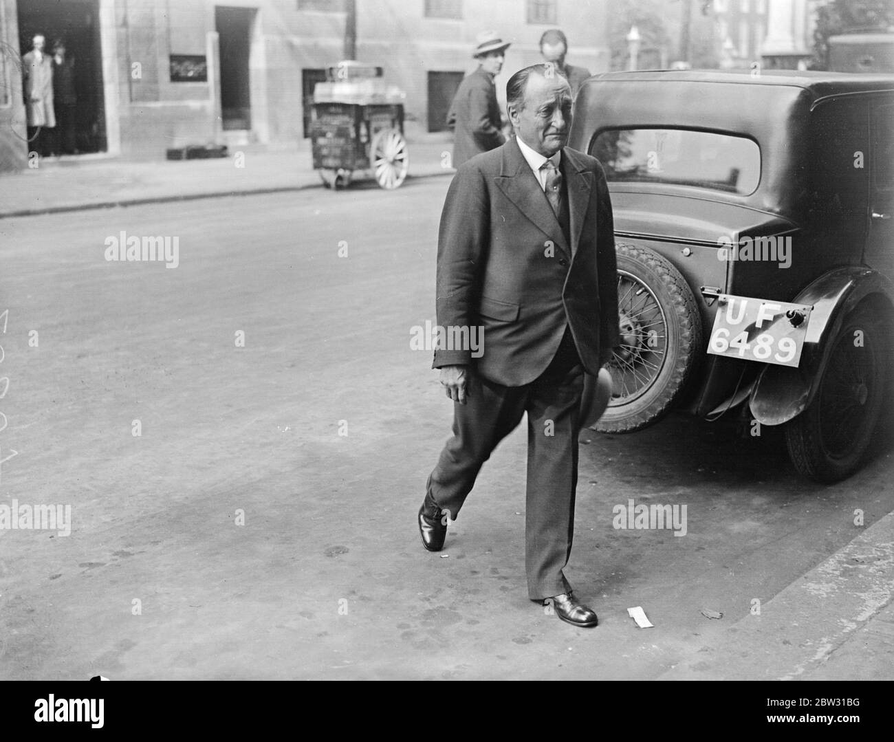 Busmen 's leaders confer at Transport House . Leaders of the Busmen 's union met at Transport House , London , to discuss the proposed omnibus strike . Ben Tillett , chairman of the Trades Union Council , leaving Transport House after the meeting . 29 August 1932 Stock Photo