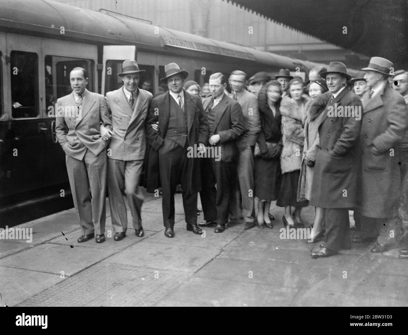 Lord Tennysons cricket team leaves for the West Indies . Lord Tennysons cricket team left Paddington Station , London on the SS Bayano boat train for the West Indies , on a cricket tour . Lord Tennyson with some of the team before departure from Paddington Station , London . 2 February 1932 Stock Photo