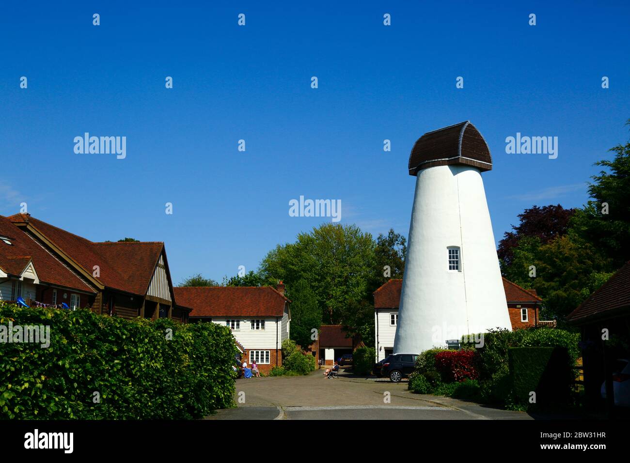 Restored and converted former windmill on new Mill Court housing estate