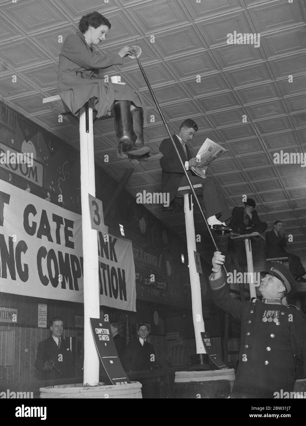 First London pole squatting contest . Freak endurance records spread to England . Mr Jack Howard shaving . 29 January 1932 Stock Photo