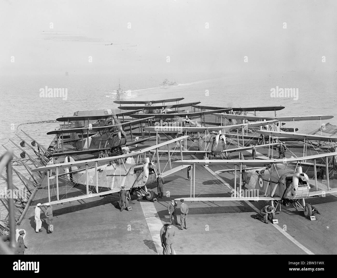 First Lord of the Admiralty Sir Bolton Eyres Monsell , left Portsmouth aboard the HMS Aircraft Carrier ' HMS Carageous ' and flew from the deck of the ship . He was present at the aerial training exercises of pilots attached to the aircraft carrier . Sir Bolton is the first ' First Lord ' to make a flight from an aircraft carrier . Blackburn Dart torpedo bomber biplane aboard HMS Courageous . 26 April 1932 . Stock Photo