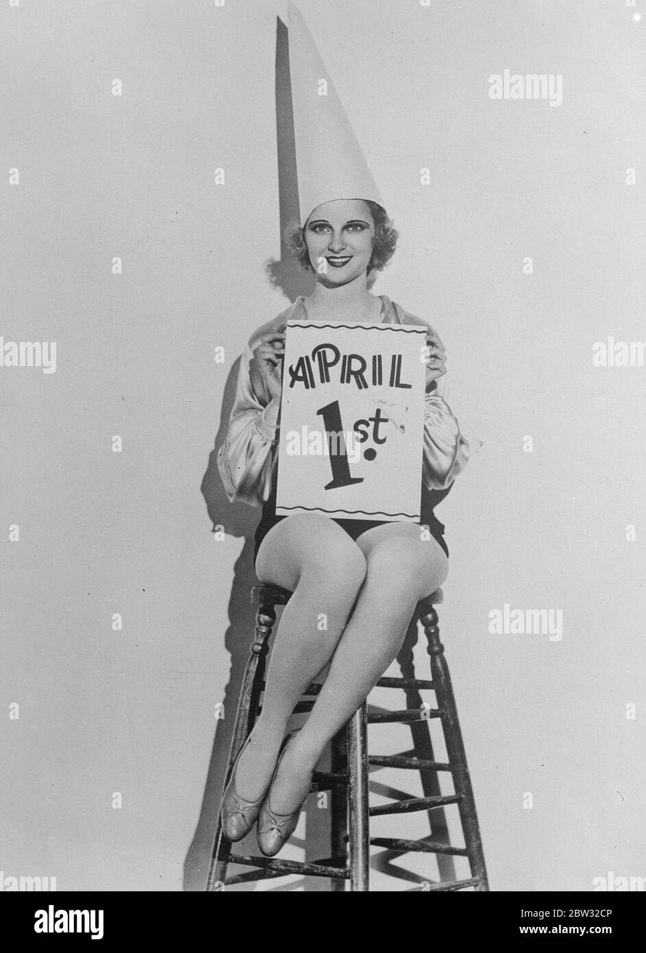 April first , A timely warning . Pretty Florine McKinney gives everybody a timely warning to watch their step on April 1st , which is the official and unofficial celebration of ' All Fool ' s Day ' . 31 March 1932 Stock Photo