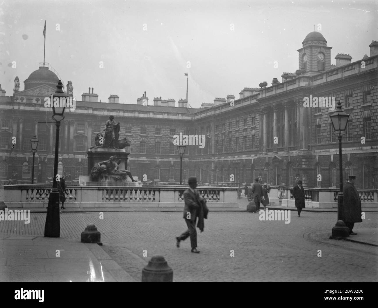 Plot to hold up Somerset house . A plot has been revealed , of plans to rob Somerset house officials in officials in the Strand of £ 80 , 000 have been revealed , and were disclosed when Scotland Yard detectives overheard the conspirators at the bud . A view of the exterior of Somerset House , where the attack was planned . 25 April 1932 Stock Photo