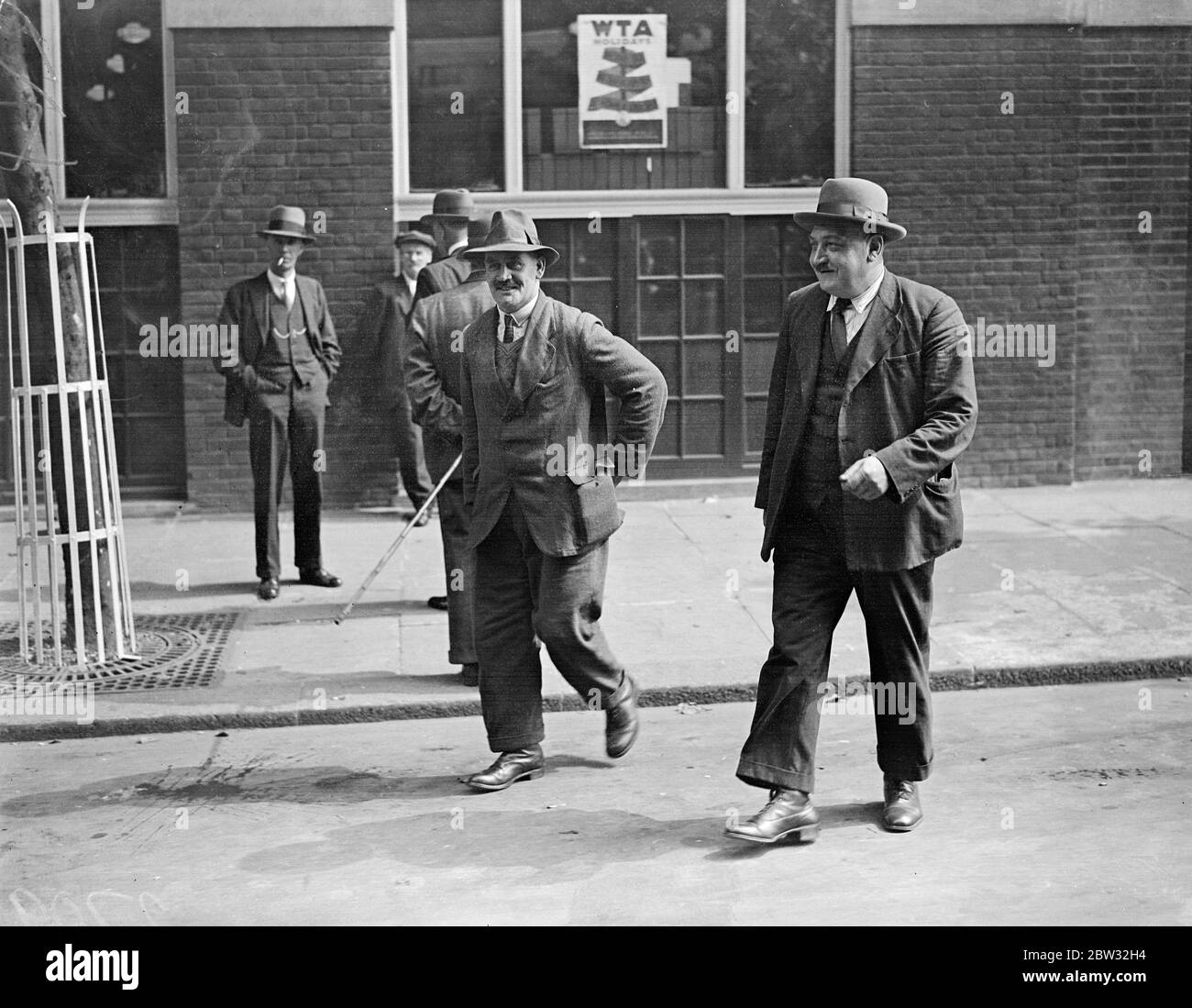 Busmen 's leaders confer at Transport House . Leaders of the Busmen 's Union met at Transport House , London , to discuss the proposed omnibus strike . Mr J Stoneman ( left ) and Mr J Mills , the London district secretary of the Transport and General Workers Union , leaving Transport House after the meeting 29 August 1932 Stock Photo