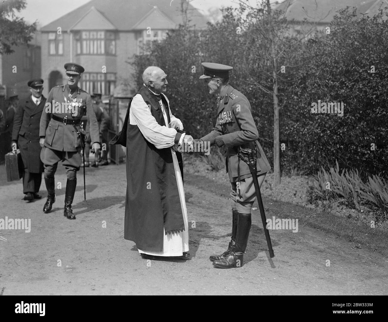 Great French general attends annual Gallipoli service in London . General Gouraud , the military Governor of Paris and prominent military commanders attended the annual memorial service to the 29th division Gallipoli at Holy Trinity Church , Eltham , London . The Bishop of London being greeted by Brigadier W W Jeff commanding at Woolwich ,, at the service . 24 April 1932 . Stock Photo