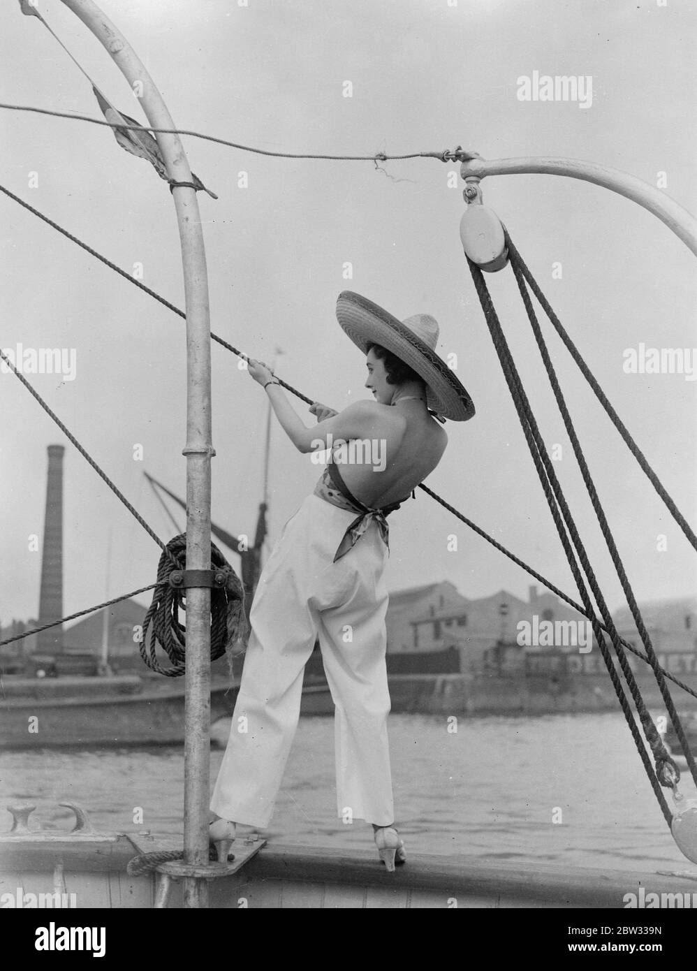 Scenes on board showboat on Thames . Mannequins displaying beach wear