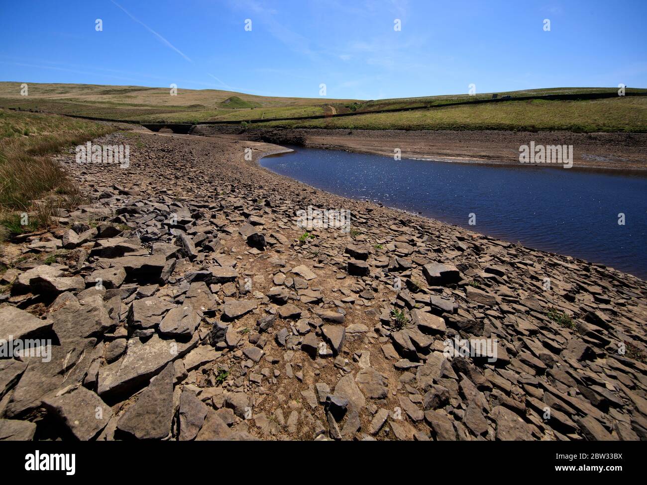 Dry banks at Dowry Reservoir in Oldham as some regions are on course for the driest May on record. Stock Photo