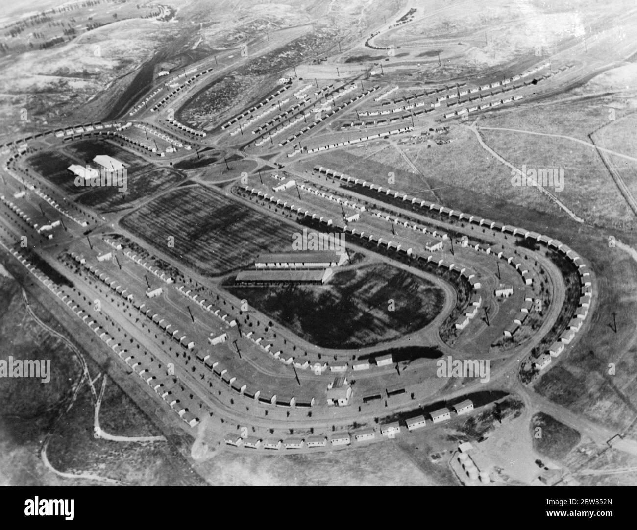 Where world athletes will be housed during the Olympic Games . An air view of Olympic Village , where two thousand athletes representing fifty nations will be housed during the Olympic Games in August in Los Angeles , California . The village is located in the Baldwin Hills , southwest of Los Angeles . 3 May 1932 Stock Photo