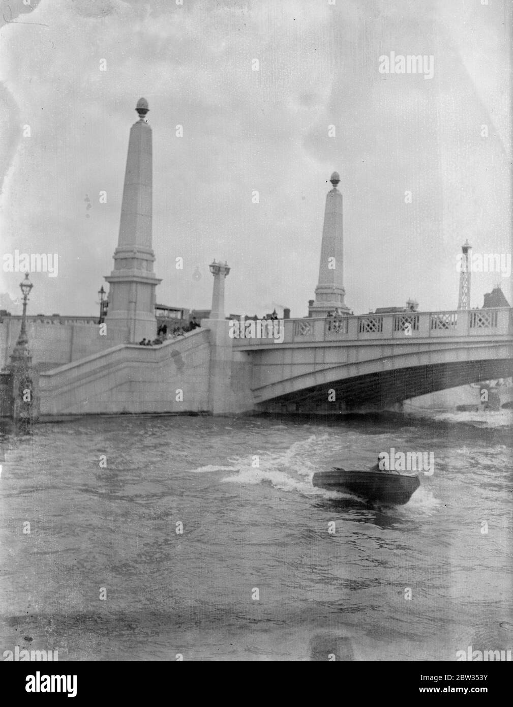 By speed boat to Antwerp . Mr R C Cole , the 21 year old London outboard motorboat enthusiast , in his outboard motorboat ' Miss Whitstable ' which is 13 feet long and has a 3 1/2 h.p engine , os attemptinga lone trip to Antwerp . He recently successfully completed completed the 550 miles journey from Westminster Bridge to Paris . Mr R C Cole at the wheel of his motorboat speeding in the Thames before the start of his trip . 4 August 1932 Stock Photo