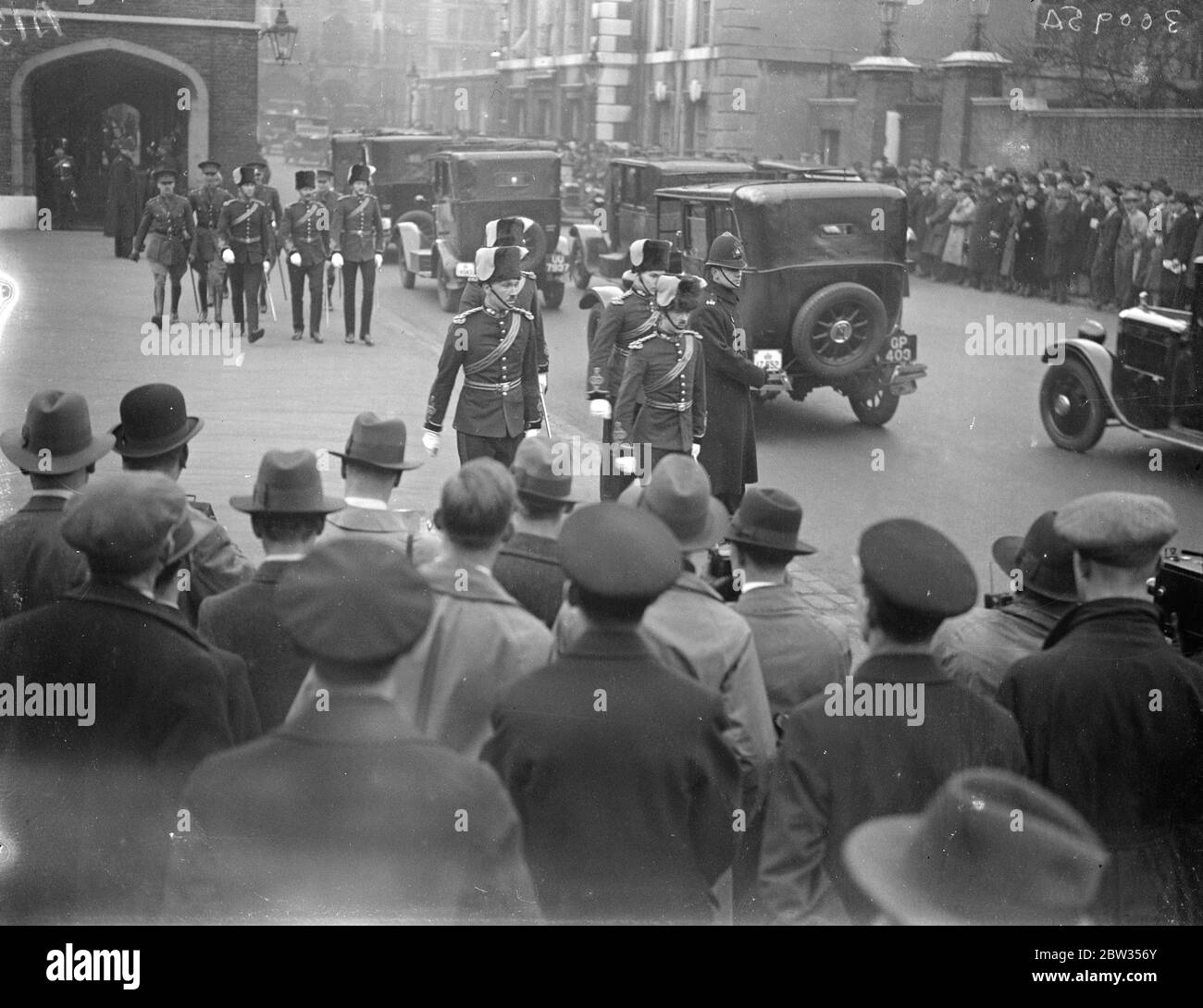 Prince of Wales represents the King at first levee . As the King is suffering from a cold , the Prince of Wales held the first Levee of the season at St Jame ' s Palace in his stead . The Prince drove fro YOrk House , St James ' s , to Buckingham Palace by car and from Buckingham Palace to St Jame ' s Palace in State escorted by a troop of Household Cavalry . Mr Thomas ( left ) and Captain Wedderburn Maxwell ( left ) and Captain Wedderburn Maxwell leaving after attending the Levee . 7 March 1933 Stock Photo