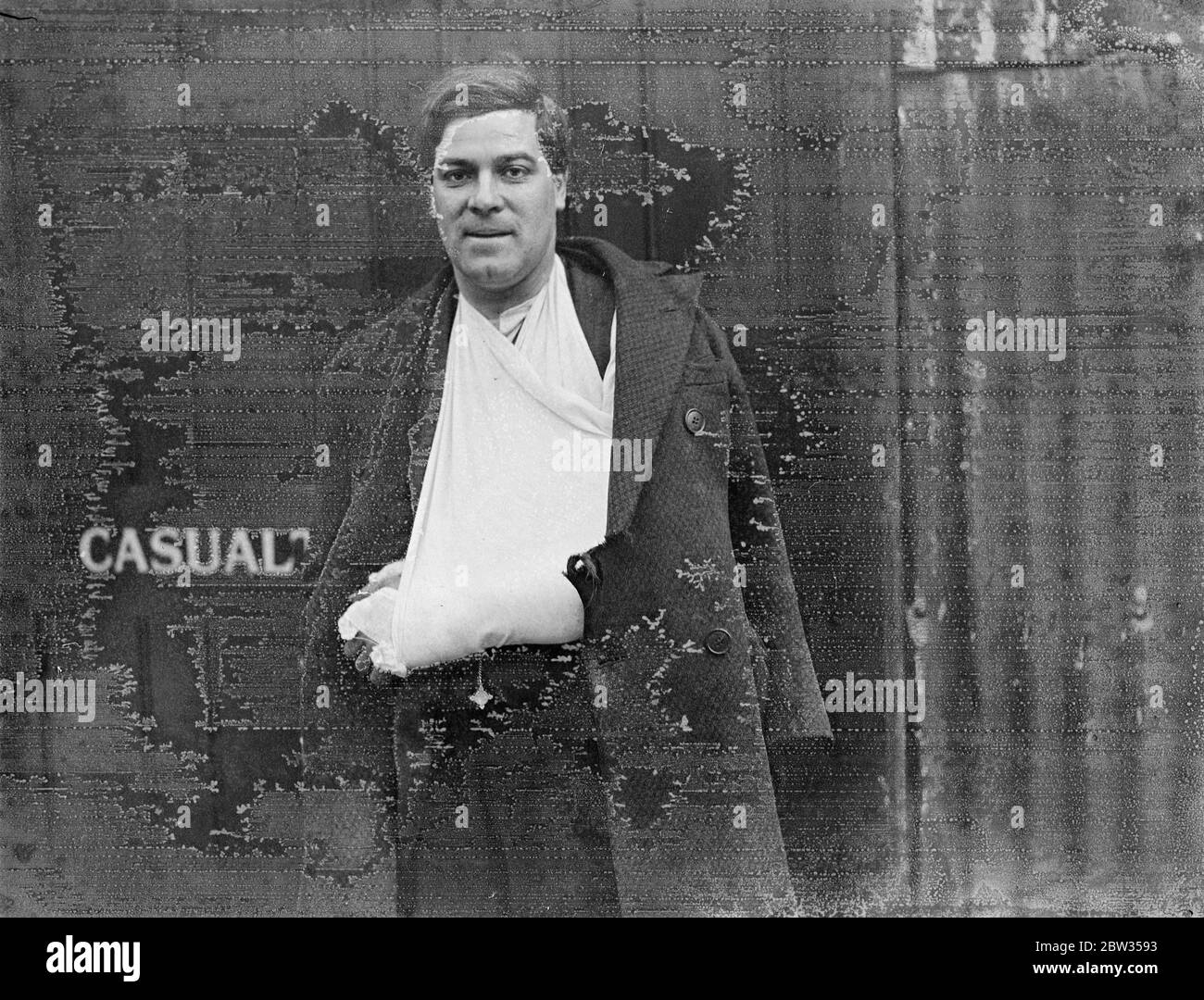 Injured in Cricklewood tramway disaster . Among those who were injured when a tramcar overturned at Cricklewood Broadway , North West London , while taking passengers home to lunch from work was Mr J A Skeet , employed by the London Midland and Scottish Railway . His wrist was fractured and ribs damaged . Mr J A Skeet leaving the Willesden General Hospital after being treated for his injuries . 20 February 1933 Stock Photo
