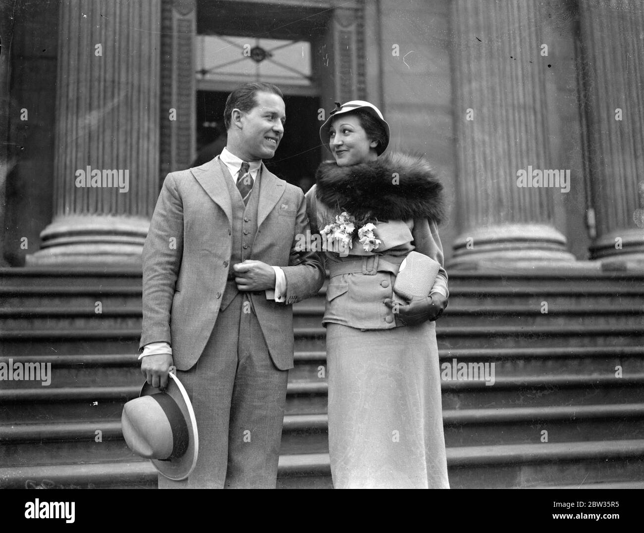 The wedding of Captain C Leven Lincoln and Miss Zimmermann . A wedding romance which began with a duel challenge in a a Carlsbad cafe has terminated today with the wedding at a London register office of Captain Charles Leven Lincoln , former English war pilot and film actor , to Miss Hilde Zimmermann , a German girl . Captain Charles Leven Lincoln and Miss Zimmermann were dancing in the Carlsbad cafe when a note was received by the lady from Count Hans Czernin , son of a former Austrian foreign minister , who was also dancing there , asking her to meet him . Captain Leven Lincoln naturally res Stock Photo