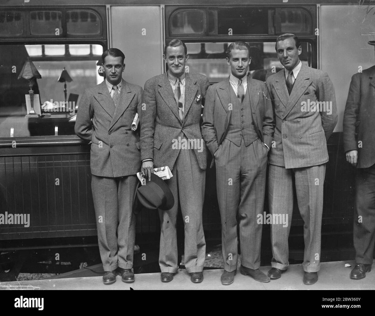 British tennis team leaves to compete in French championship . H W Austin , G P Hughes , H G N , Lee and F J Perry left Victoria Station , London for Paris where they are to compete in the French International Lawn Tennis Championship . Photo shows , left to right ; H G N Lee , G P Hughes , H W ( Bunny ) Austin and F J Perry at Victoria Station before leaving for Paris . 19 May 1933 Stock Photo