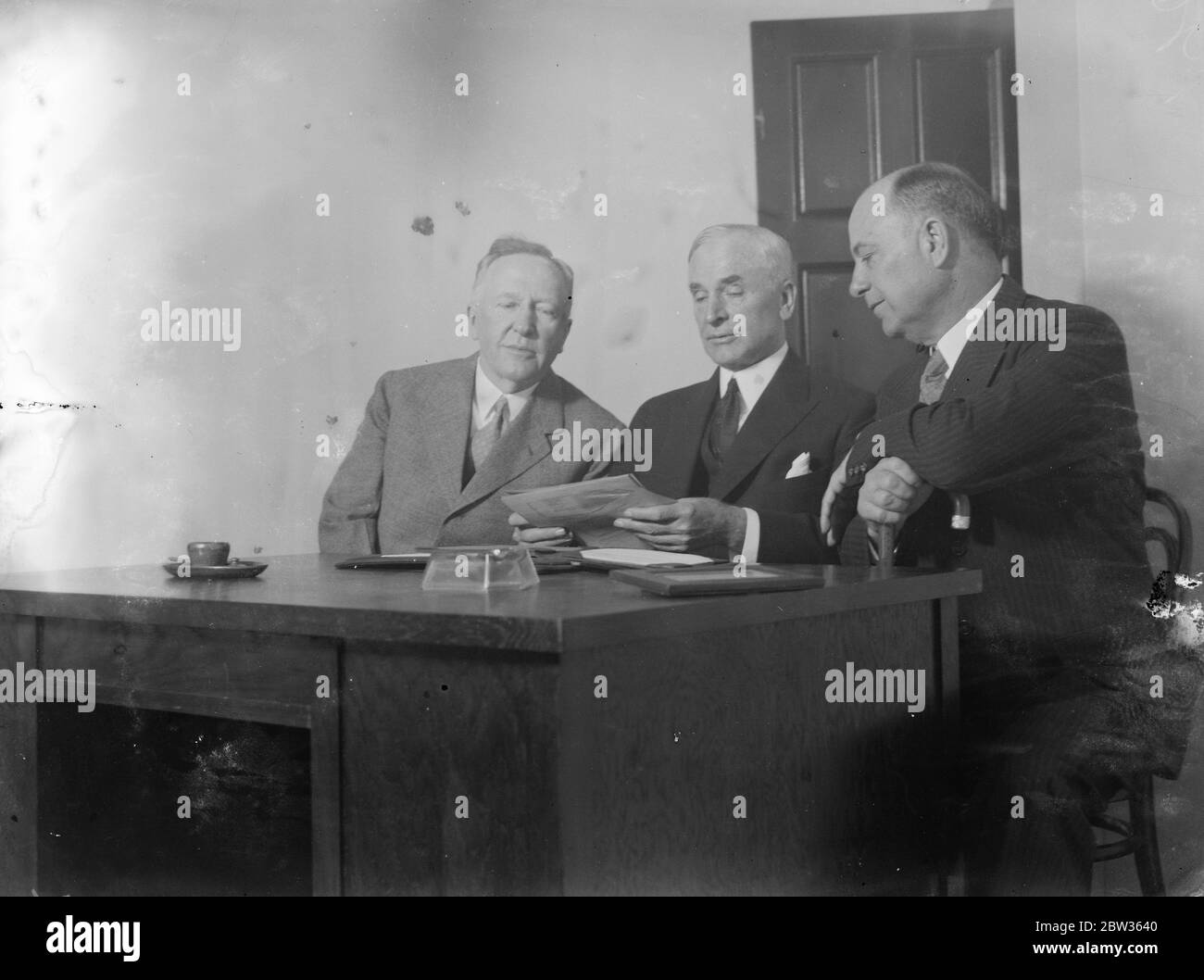 American delegates to World Economic Conference . The American delegates to the World Economic Conference held a conference of their own in their London hotel . Left to right Samuel D McReynolds , chairman of the Foreign Affairs Committee of the House of Representatives , Secretary of State , Mr Cordell Hull and Mr Ralph W Morrison . 9 June 1933 Stock Photo