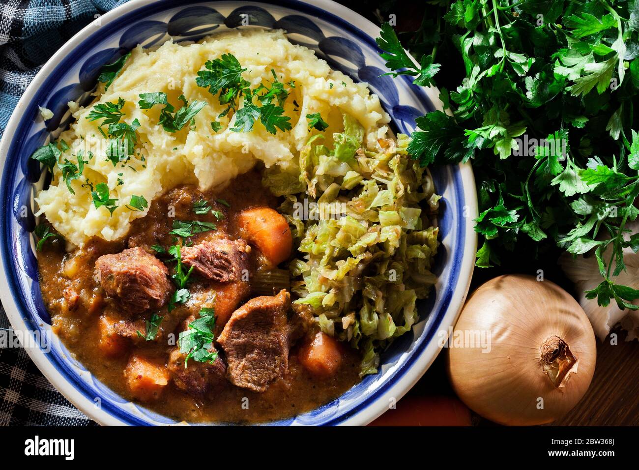 Traditional irish stew served with mashed potatoes and cabbage. Top ...