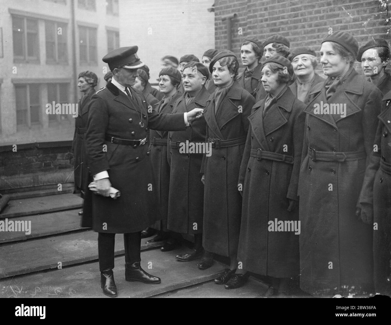Commandant Mary Allen makes first inspection of women 's reserve . The first inspection of the Women 's Reserve after the issue of the new uniforms took place at the organisation 's headquarters in Tothill Street , Westminster , and was carried out by Commandant Mary Allen , of the Women 's Auxiliary Service . The Women 's Reserve was formed to provide training for large bodies of women in readiness for any civil or military emergency . Commandant Mary Allen inspecting . 28 November 1933 Stock Photo