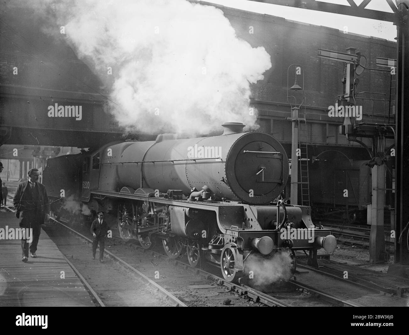 Britains most powerful passenger locomotive at Euston . The first of three giant new locomotives which constitute the most powerful express passenger type in Great Britain made its first appearance at Euston Station , London . The engine has been designed for duty on the heaviest Anglo Scottish expresses of the LMS . Photo shows , the new locomotive entering Euston Station , London . 28 June 1933 Stock Photo
