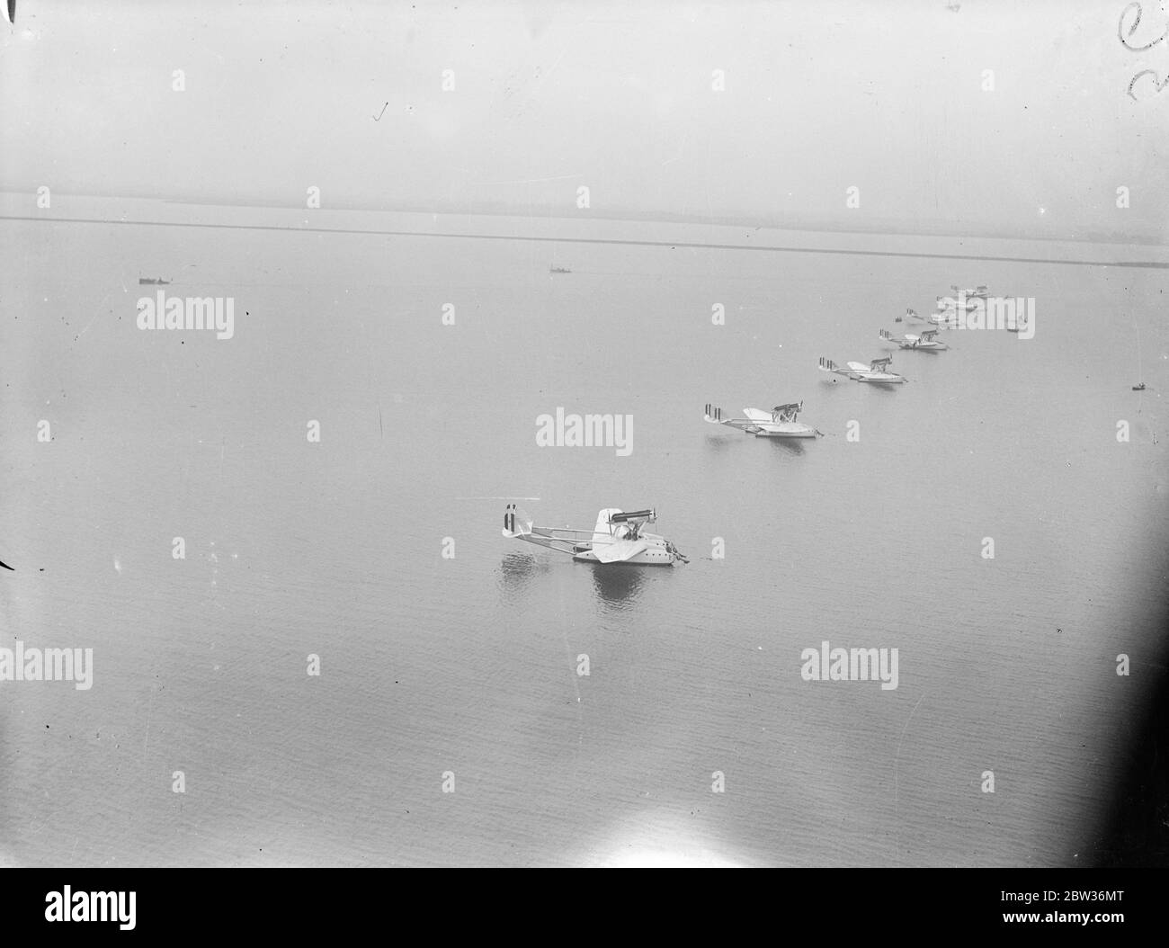 One killed four injured on first stage of great formtion flight to United States . A tragedy marred the first stage of the flight of the Italian air armada of 24 Savoia - Marchetti SM.55X flying boats , led by General Balbo , the Italian Air Minister , to America . On arrival at Amsterdam from Ortobello , near Rome , one of the machines capsized killing one airman and injuring four others . The other 23 machines will continue the flight , the greatest formation flight ever attempted . Photo shows ; planes of the the Italian air armada lined up on the water at Amsterdam . 1 July 1933 Stock Photo