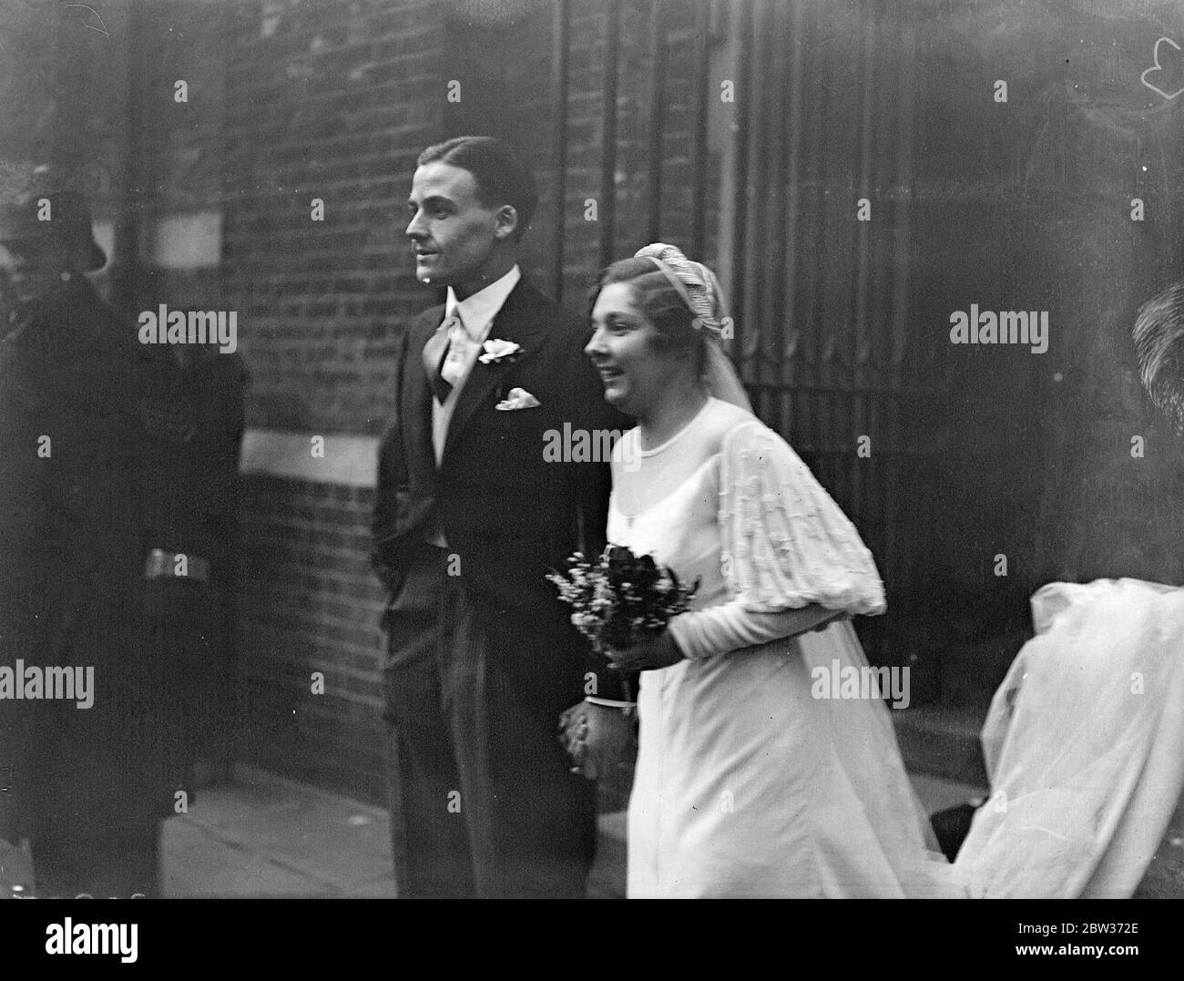 Link with ' Alice in Wonderland ' at London wedding . A link with the story of ' Alice in Wonderland ' was represented by the wedding at Holy Trinity Church , Sloane Street , London , of Miss Barbara Liddell , who is a grand daughter of the late Dean of Christ Church , Oxford and a niece of Mrs Reginald Hargreaves , the original ' Alice ' , to Mr Peter Martinea . Mrs Hargreaves was present at the ceremony . Photo shows ; The bride and groom . 5 December 1933 Stock Photo
