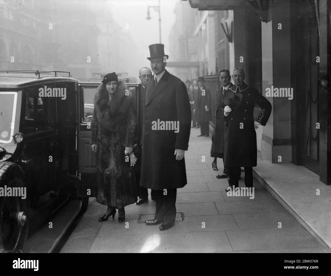 King and Queen of Denmark on shopping visit to London . The King and Queen of Denmark who arrived last night are spending a week in London for Christmas shopping . Photo shows ; The King and Queen of Denmark leaving Claridges Hotel . 11 December 1933 Stock Photo