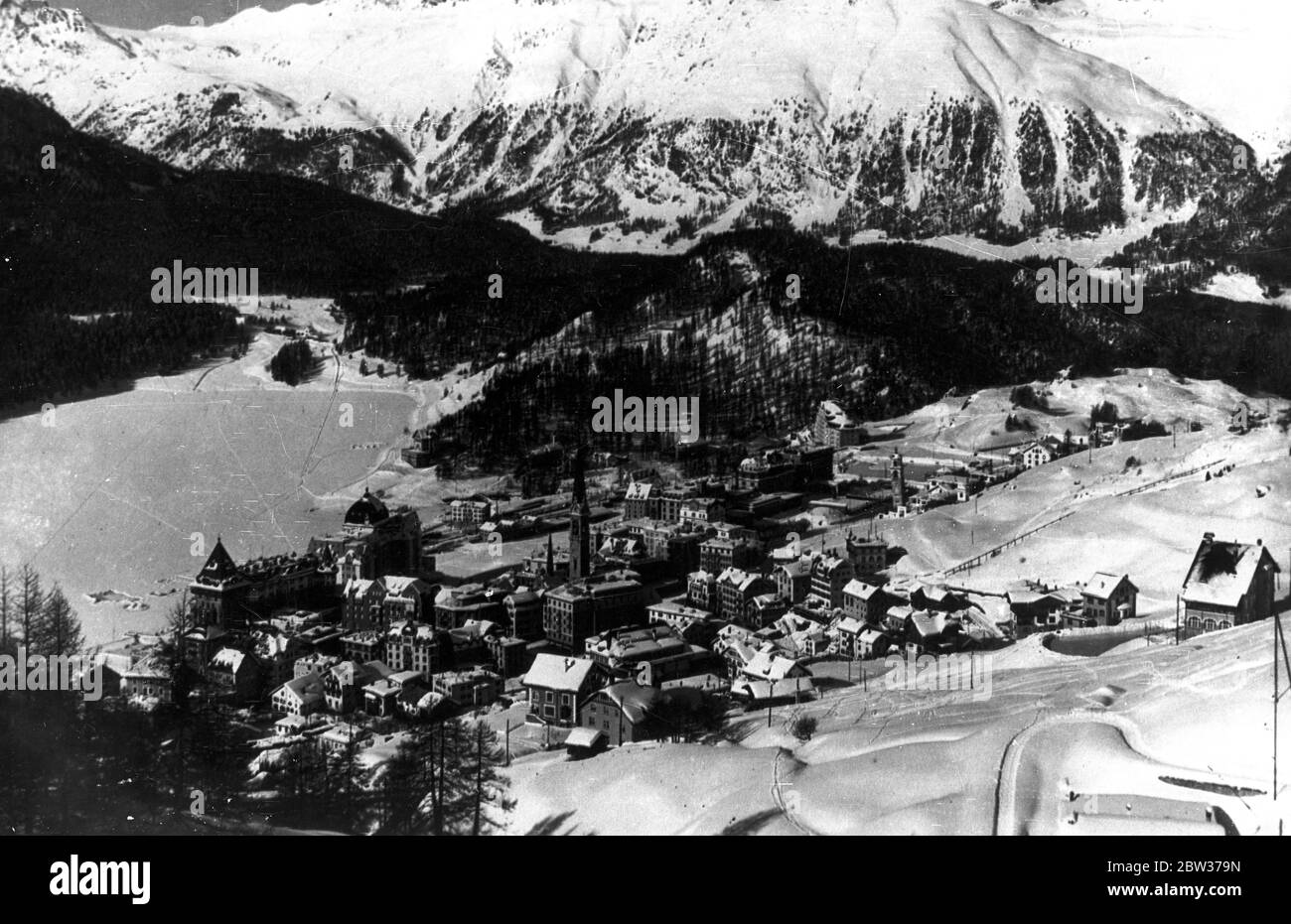 Winter beauty among the alps . St Moritz , in a picturesque setting beneath a carpet of snow . Winter sports are now in full swing at this Swiss resort . 31 December 1933 Stock Photo