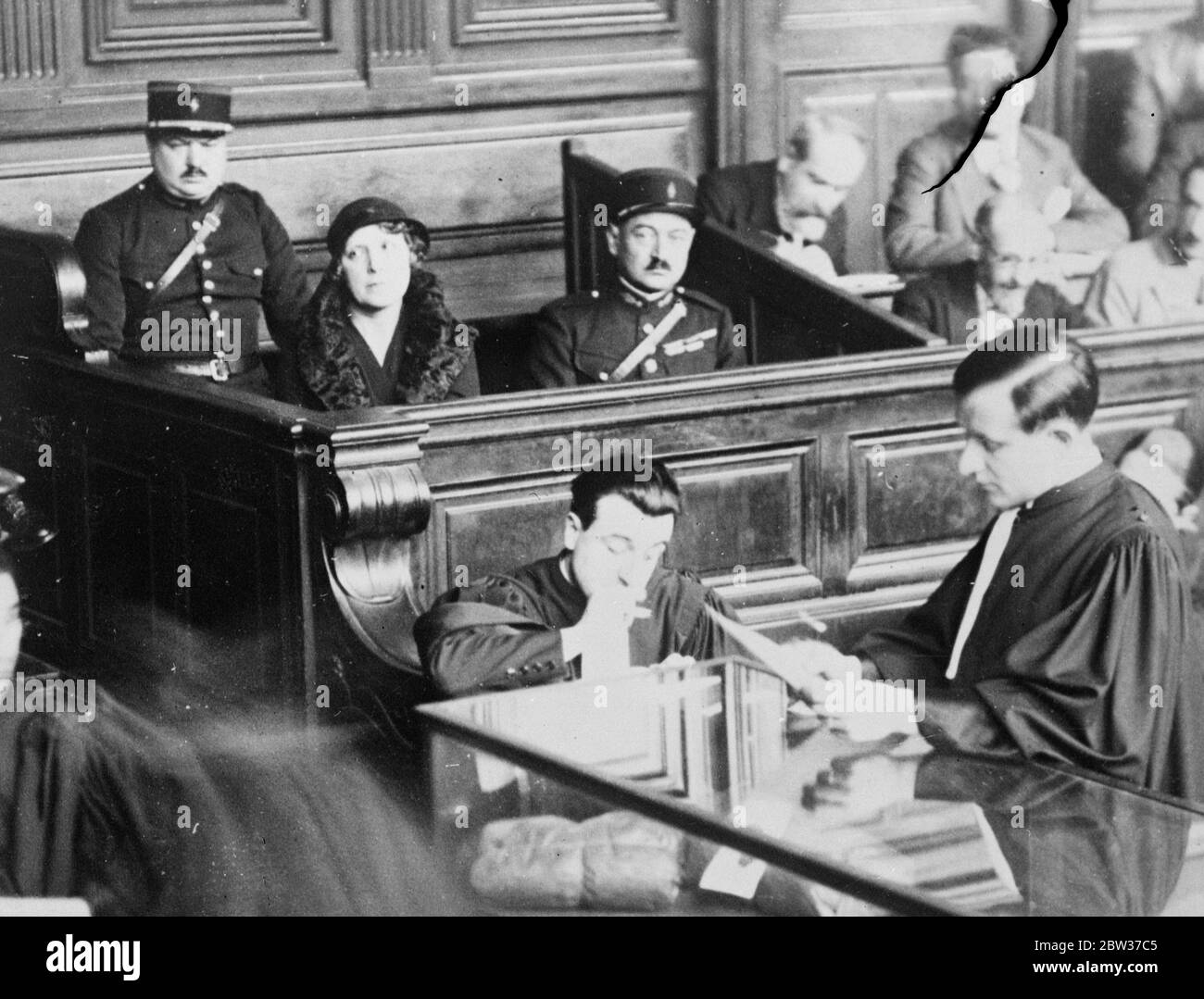 Famous beauty on trial for murder in Paris . The life story of one of the most famous and beautiful demi - mondaines that Paris has known during the last 25 years was related before the Assize Court in Paris when Germaine Huot , better known as Germaine d ' Anglemont , the former favourite of Dukes and princess ' s appeared to answer the charge of having murdered a year ago Jean Causeret , the perfect of the department of the Bouches du Rhone , and the last of her lovers . M Causeret was shot in Madame d ' Anglemont ' s flat , but she declared it was an accident . Photo shows Madame Germaine H Stock Photo
