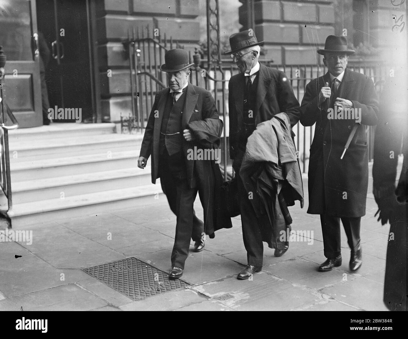 Mr Baldwin at the opening of new London library building . Mr Stanley Baldwin attended the opening of the new , London Library building in St James' Square . Photo shows , Mr Baldwin and the Rt Hon H A LFisher arriving for the ceremony . 13 April 1934 Stock Photo