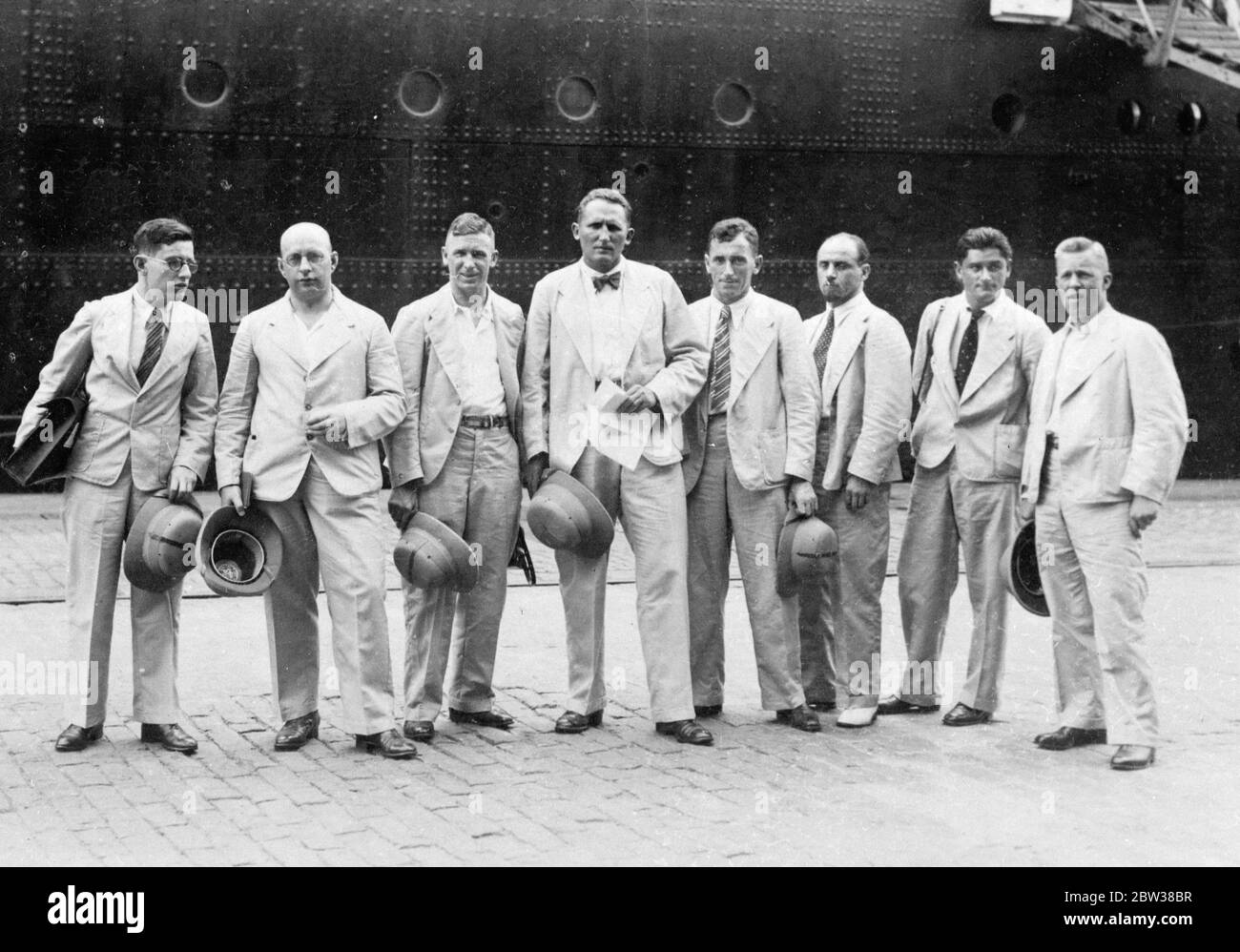 German Himalayan Expedition in Bombay . 9 May 1934 Nine mountaineers (8 shown) were: Peter Aschenbrenner of Kufstein, Fritz Bechtold of Trostberg, Willi Bernard, the doctor of the expedition, from Hall, Alfred Drexel and Willy Merkl from Munich, Peter Miillritter from Trostberg, Erwin Schneider from Hall, Willi Welzenbach from Munich, and Uli Wieland from Ulm. The scientific group consisted of the cartographer Richard Finster- walder from Hannover, the geographer Walter Raechl from Munich, and the geologist Peter Misch from Gottingen. Stock Photo