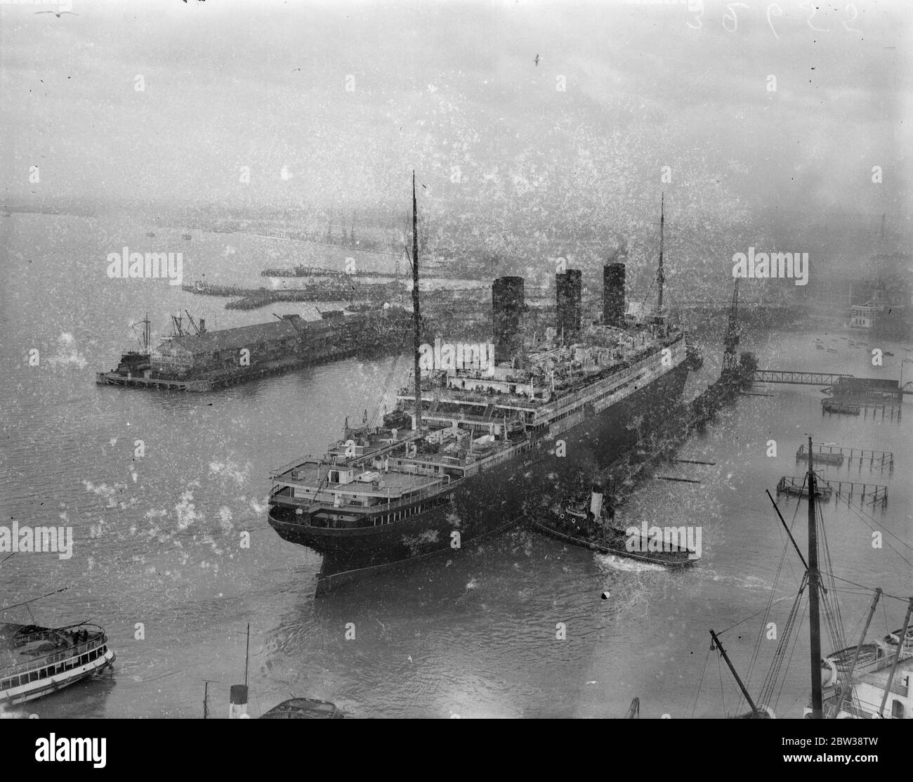 Berengaria goes into floating dry dock for overhaul at Southampton