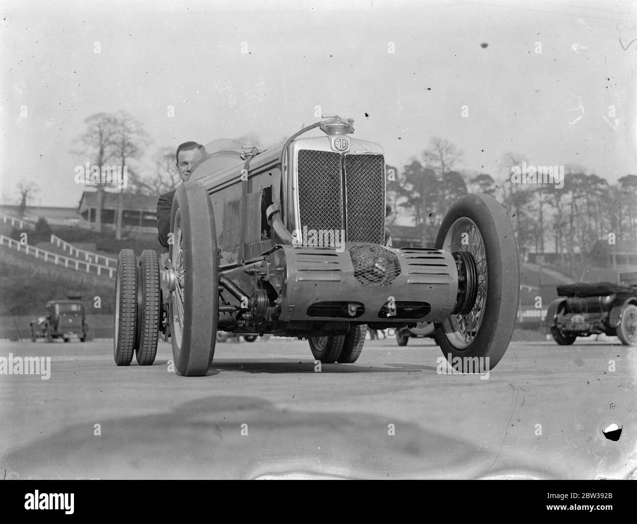 Car with double rear wheels for Brooklands mountain race . Mr D N Letts M G car was tried out at Brooklands in preparation for the Easter racing . It is equipped with double rear wheels specially for the Mountain race on Monday . Photo shows ; Mr D N Letts ' car with the double rear wheels out at Brooklands . 28 March 1934 30s, 30's, 1930s, 1930's, thirties, nineteen thirties Stock Photo