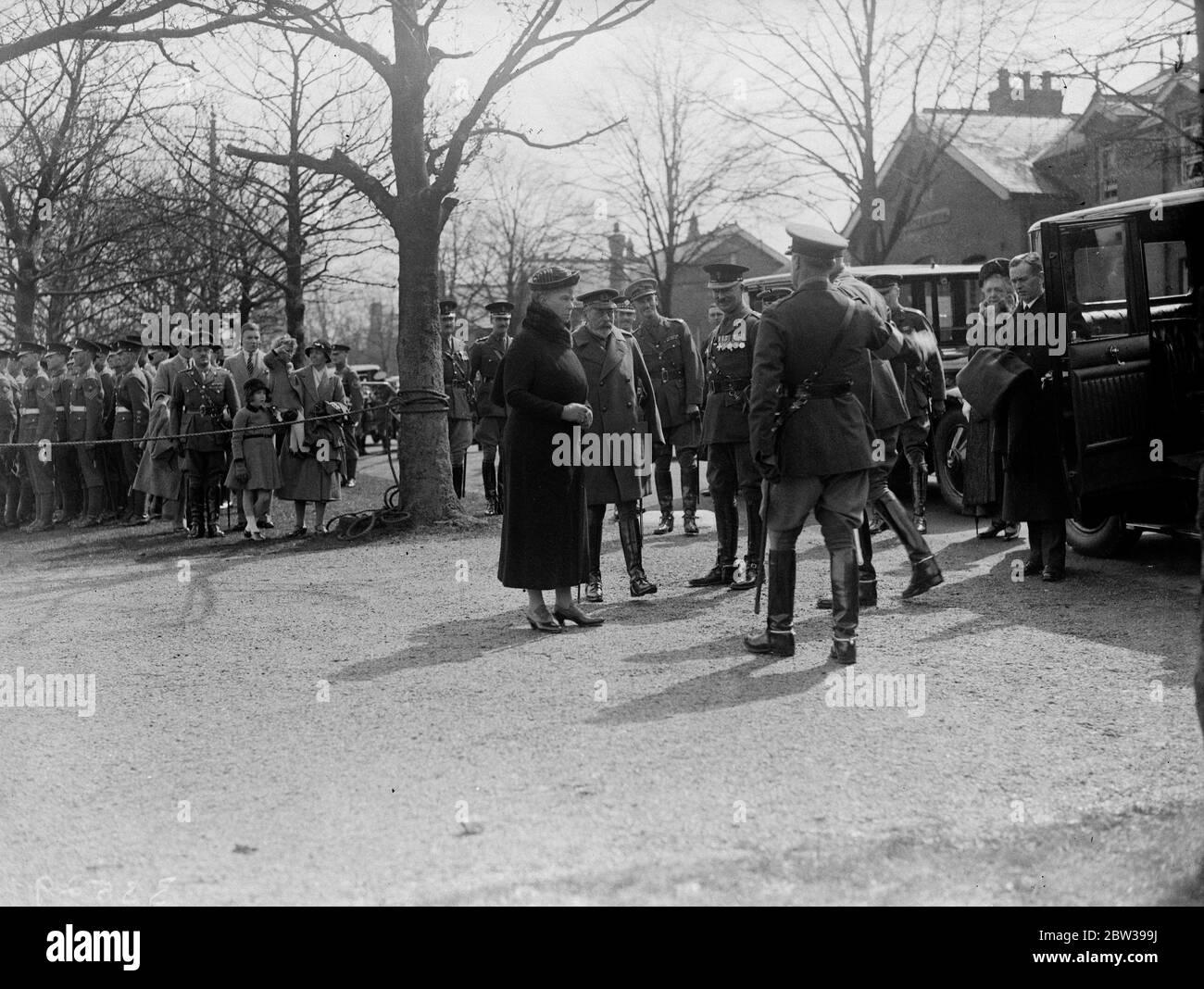 King and Queen visit Aldershot . Their Majesties , the King and Queen , drove from Windsor to Aldershot and spent the whole day visiting various sections of the camp and inspecting a number of regiments . Photo shows , the King and Queen being welcomed on arrival at Aldershot . 19 April 1934 . 30s, 30's, 1930s, 1930's, thirties, nineteen thirties Stock Photo