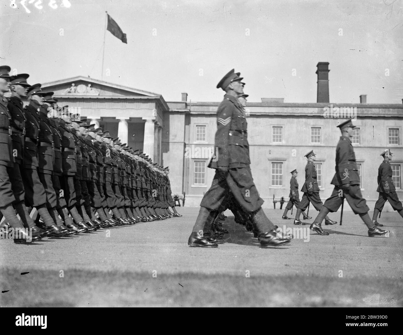 Duke of Connaught inspects cadets at Royal Military College , Sandhurst . The Duke of Connaught made his annual inspection of the Gentlemen cadets at the Royal Military College Sandhurst , Camberley , Surrey . Photo shows ; The march past of the senior cadets at the college during the inspection . 18 September 1933 30s, 30's, 1930s, 1930's, thirties, nineteen thirties Stock Photo