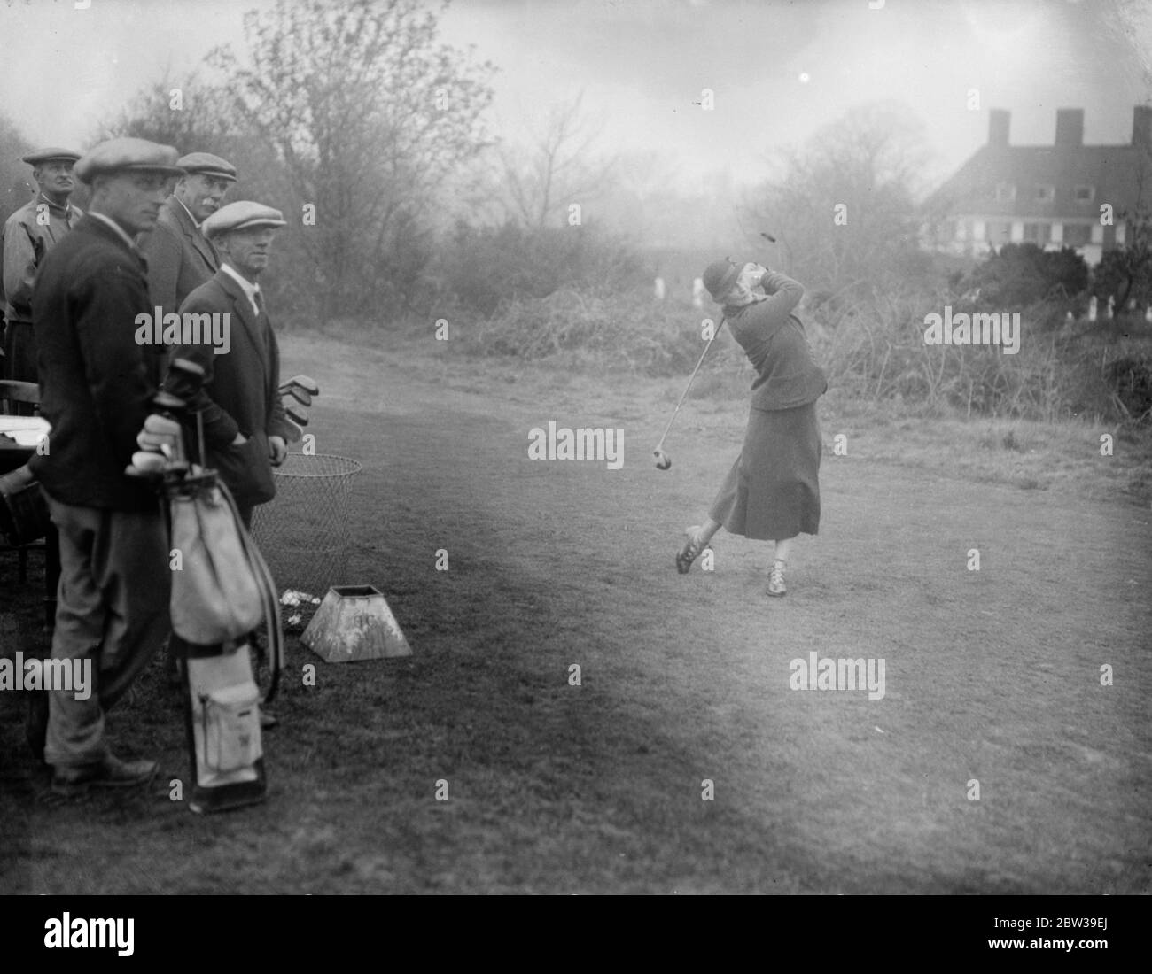 Lady Astor plays in first round of Parliamentary Golf Handicap at Walton Heath . The Prince of Wales , Lady Astor and 120 members of Parliament , took part in the first round of the Parliamentary Golf Handicap which was played on the Walton Heath course , Surrey . Photo shows , Lady Astor driving from the 1st tee at Walton Heath . 28 March 1933 Stock Photo