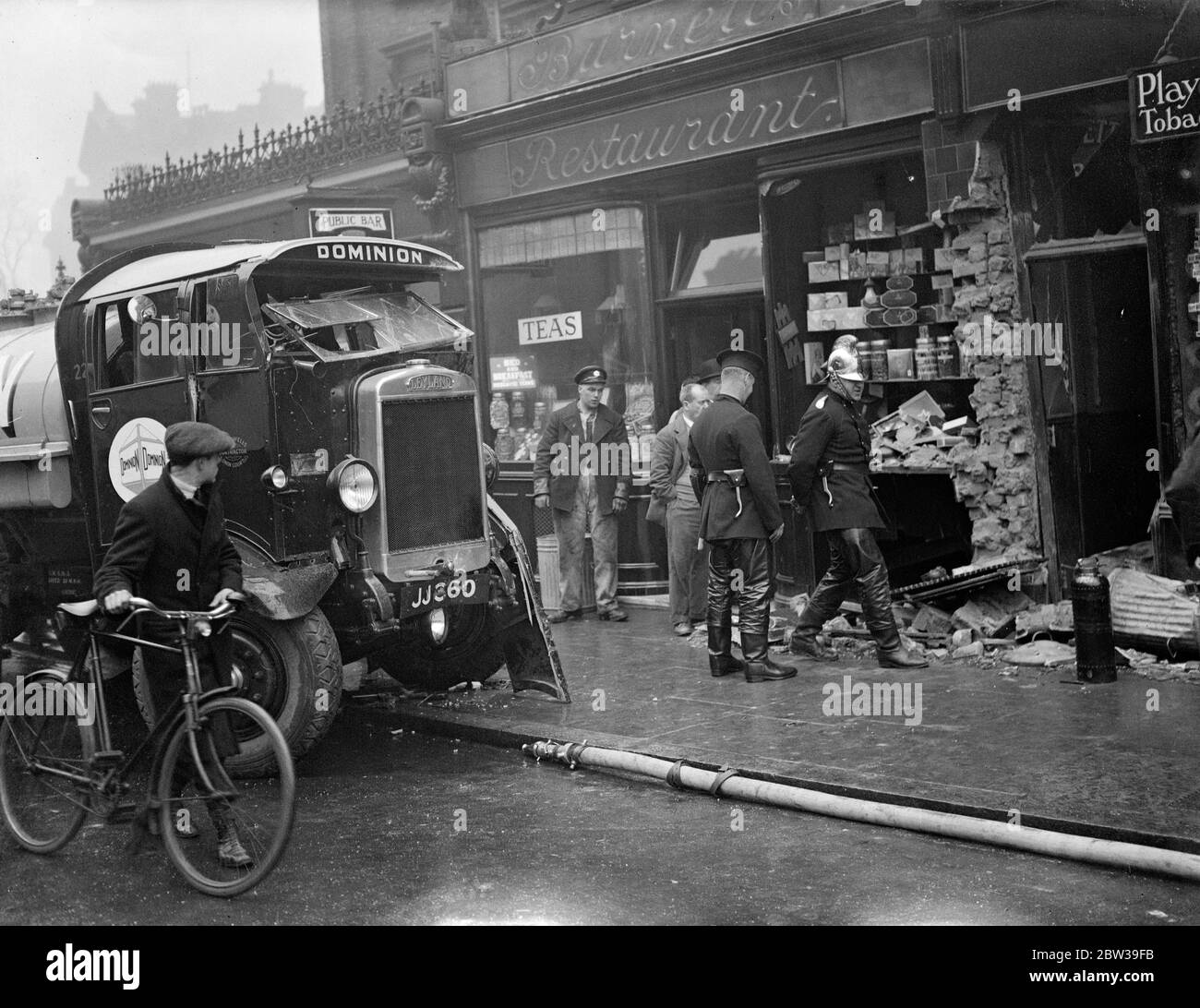 Lorry crashes into shop window . 28 April 1934 Stock Photo