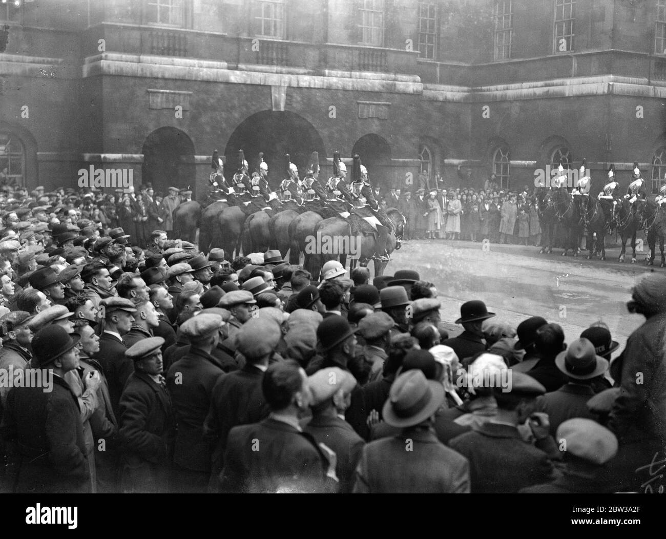 Crowds watching the ceremonial at Horse Guards , Whitehall , London . . April 1934 Stock Photo