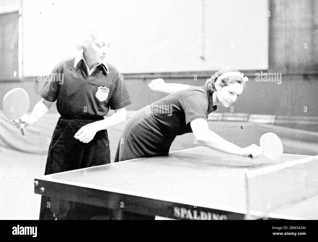 Daughter of Babe Ruth with American champion at table tennis tournament .  The world table tennis championships were continued at the Imperial  Institute , Kensington . Julia Ruth ( left ) ,
