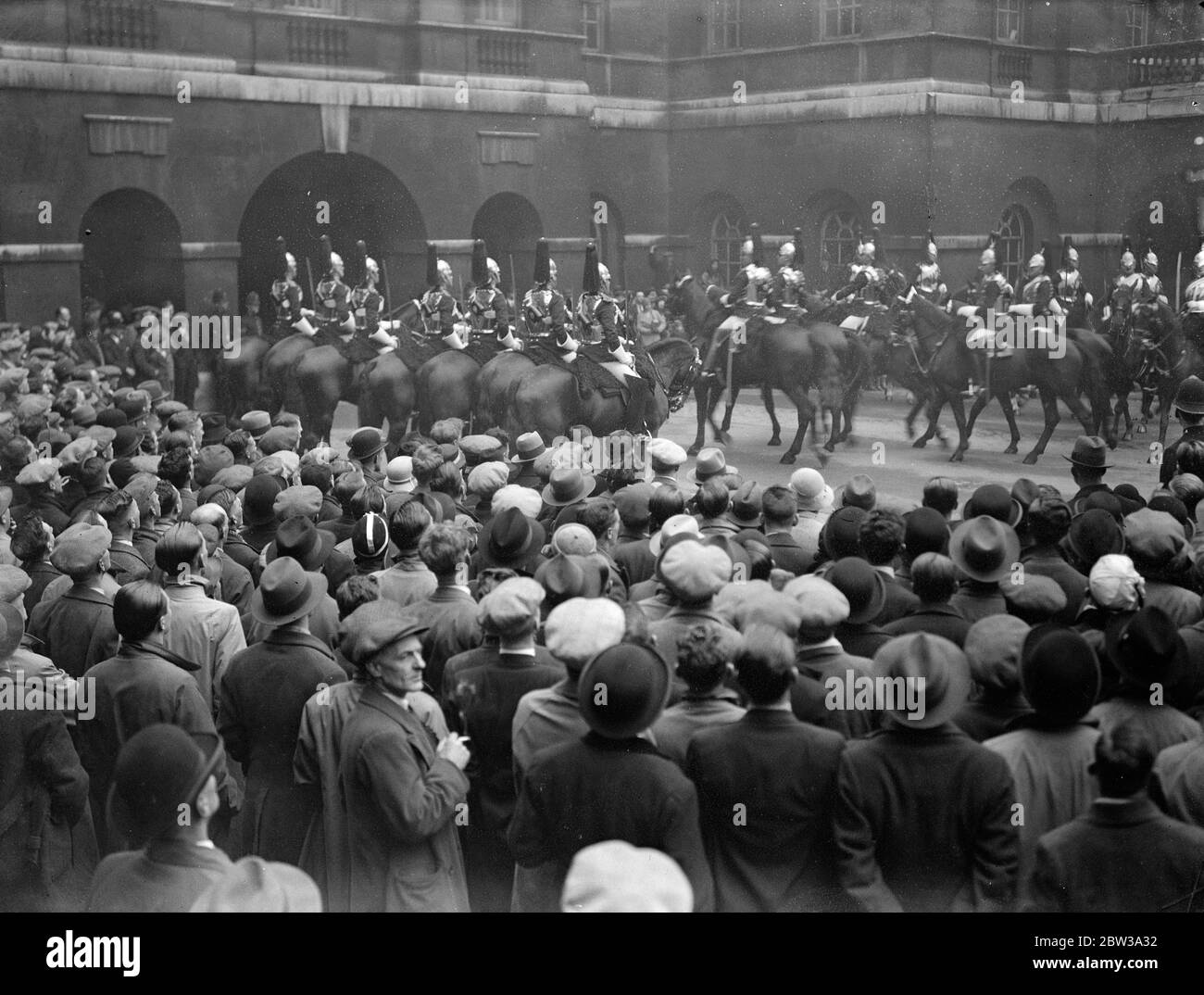 Crowds watching the ceremonial at Horse Guards , Whitehall , London . . April 1934 Stock Photo