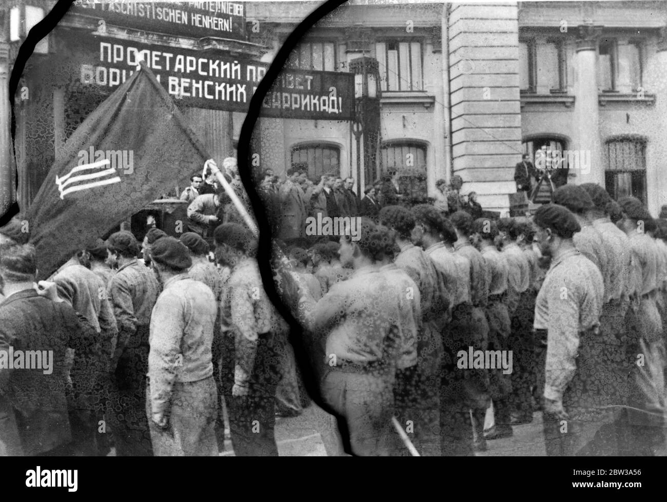Austrian Socialists feted in Moscow after fleeing their homeland . All Moscow turned out to welcome several hundred members of the Austrian Schutzbund , the socialist organisation , who are exiled from their country after having fought against the Government forces in the recent civil war in Austria . The refugees had sought refuge in Czechoslovakia before going to Russia . Photo shows members of the Schutzbund in uniform on arrival in Moscow . 30 April 1934 Stock Photo