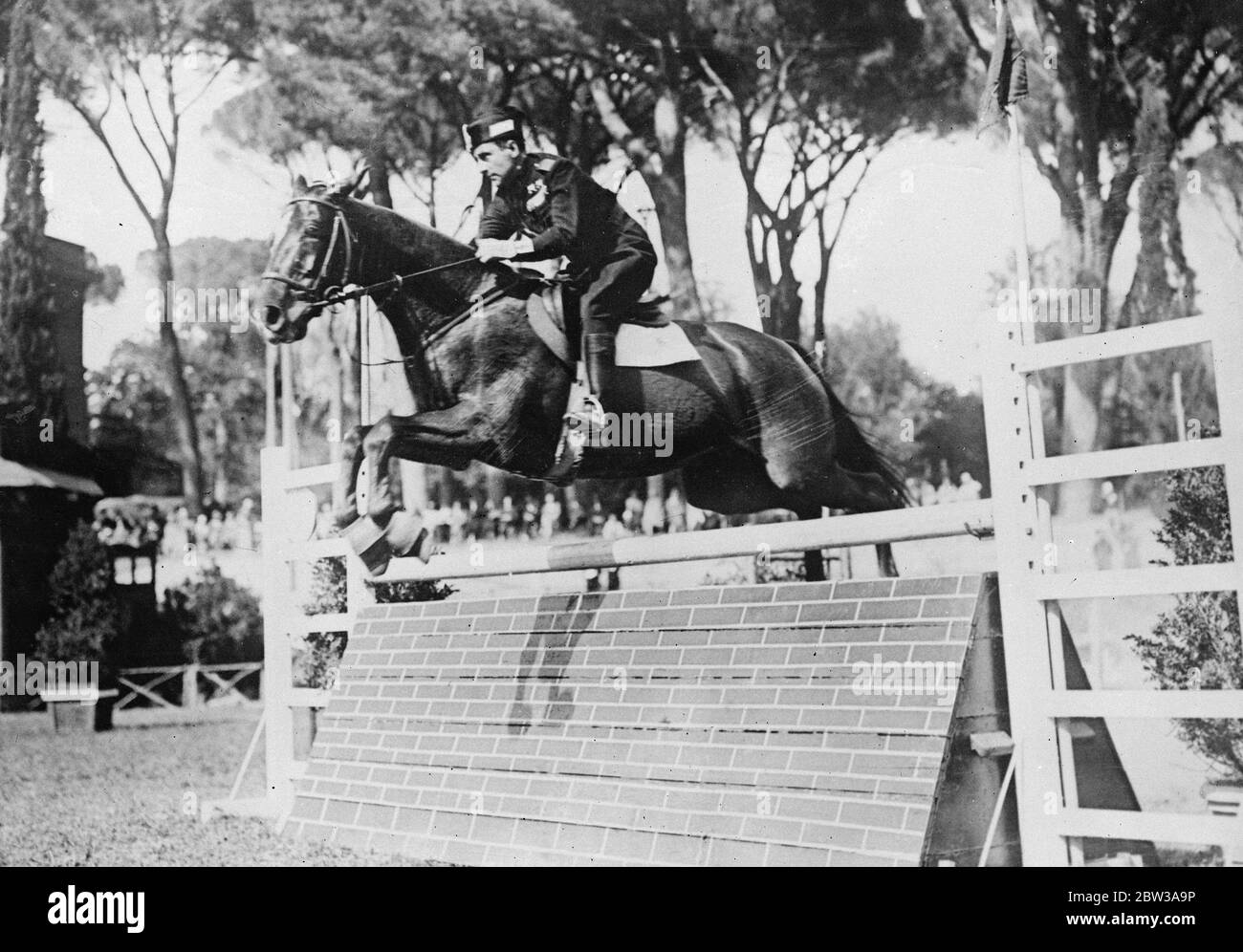 Signor Starace , Secretary General of the Italian Fascist Party , clearing an obstacle on his mount Maipur during the International Riding Tournament at Rome . May 1934 Stock Photo