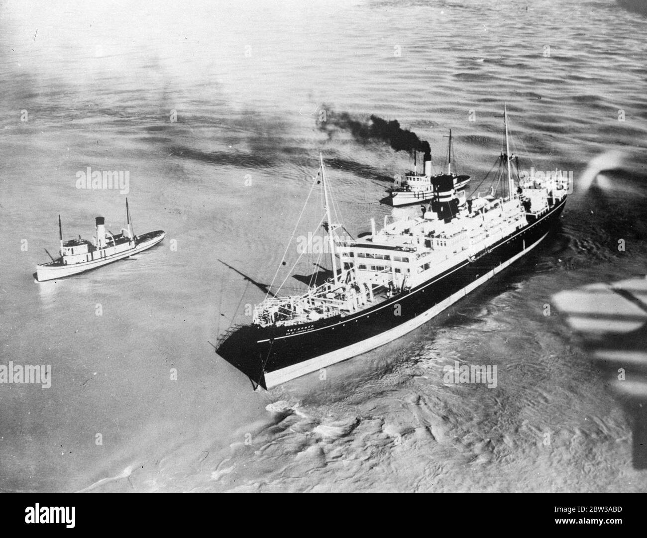 Japanese motorship aground at New Orleans . The Japanese motor ship Rio de Janeiro Maru , grounded at the mouth of the Mississippi River at New Orleans with 60 passengers on board and carrying a cargo of coffee , bound for New Orleans from Brazil . The passengers were taken off safely . Photo shows the Japanese motorship Rio de Janeiro Maru , aground off New Orleans . 26 April 1934 Stock Photo